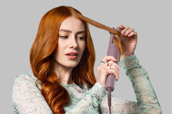 Remington AIRvive CI8930 product in use