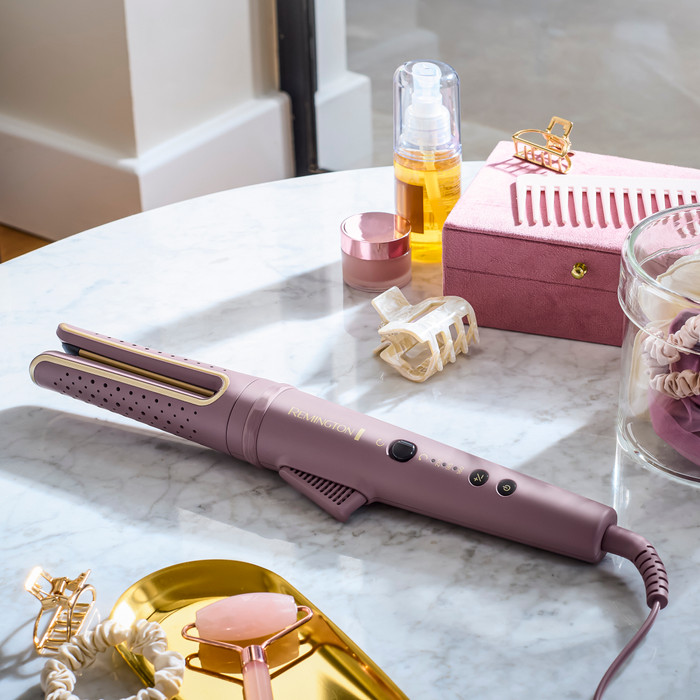 Remington AIRvive CI8930 product in use