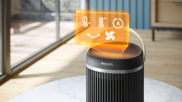 Philips Compact Ceramic Heater 3000 Series product in use