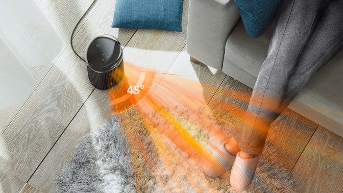 Philips Compact Ceramic Heater 3000 Series product in use