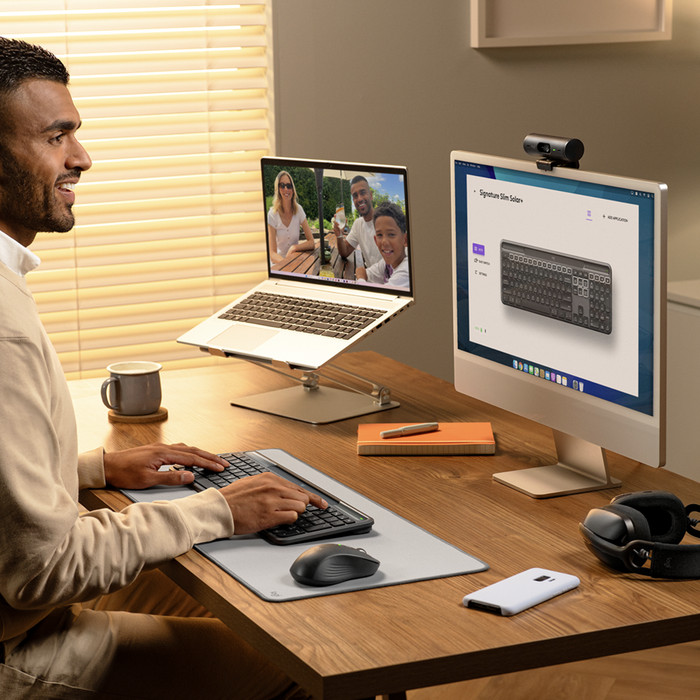 Logitech Signature Slim Solar+ Wireless Keyboard QWERTY product in use