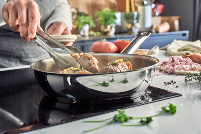 Demeyere Cosi 3 Stainless Steel Frying Pan Set 24cm + 28cm product in use