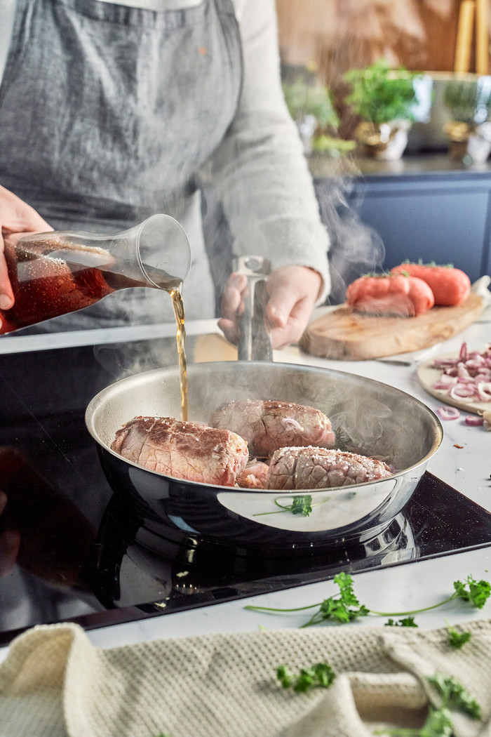 Demeyere Cosi 3 Stainless Steel Frying Pan Set 24cm + 28cm product in use