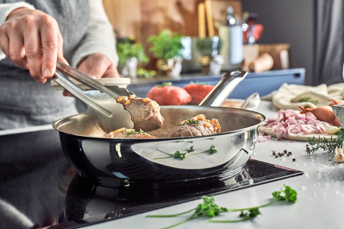 Demeyere Cosi 3 Stainless Steel Frying Pan Set 24cm + 28cm product in use