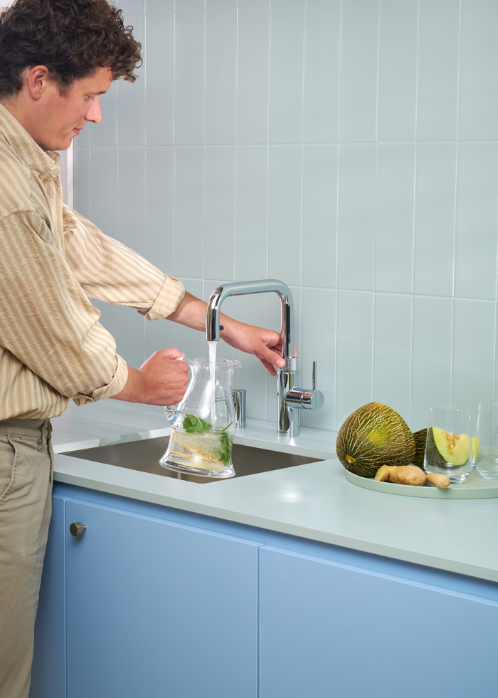Quooker COMBI+ and Quooker Flex Square Chrome and Quooker CUBE product in use