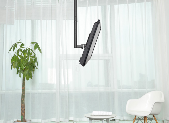 Neomounts FPMA-C060BLACK TV Plafondsteun Zwart product in gebruik