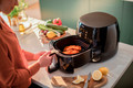 Philips Airfryer XXL Smart Sensing Premium HD9867/90 product in use