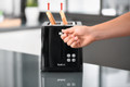 Tefal Smart & Light TT6408 Toaster product in use