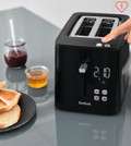Tefal Smart & Light TT6408 Toaster product in use