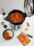 Tefal CY505E All-in-One Slowcooker, Multicooker, and Pressure Cooker product in use