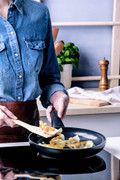 BK Brilliant High-sided Skillet 24cm with Lid product in use