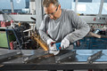 Bosch Professional GWS 18V-15 C 5,0 Ah GBA Accu (2x) Starterspakket product in gebruik