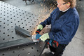 Bosch Professional GWS 18V-15 C 5,0 Ah GBA Accu (2x) Starterspakket product in gebruik
