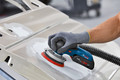 Bosch Professional GEX 18V-125 5,0 Ah GBA Accu Starterspakket product in gebruik