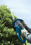 Makita UH5570 product in gebruik