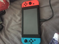 Nintendo Switch Rood&#x2F;Blauw + 35 eShop tegoed (Afbeelding 1 van 3)