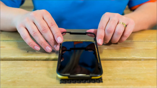 How do you apply a screen protector on your smartphone?