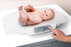 Alecto BC-30 baby scale with carrying bag product in use