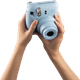 Fujifilm Instax Mini 12 Pastel Blue + Photo Paper (20 units) product in use