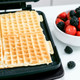 GreenPan Elite Waffle Iron Black product in use