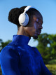 Bose QuietComfort Ultra Headphones White + Charger product in use