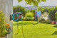 Gardena Wandslangenbox PowerRoll XL P4A Set + Premium Broes Metaal product in gebruik