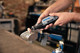 Dremel 4250 JA + 35-Piece Accessory Set product in use