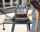 Ninja Woodfire Pro XL Electric BBQ Grill and Smoker OG901EU + Ninja Woodfire Stand product in use