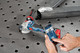 Bosch Professional GWS 18V-10 5.0Ah GBA Battery (2x) Starter Pack product in use