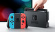 Nintendo Switch Rood/Blauw + Mario Kart 8 Deluxe product in gebruik