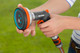 Gardena Wandslangenbox 35 RollUp XL wit + Premium Broes product in gebruik